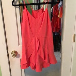 Coral ruffle romper
